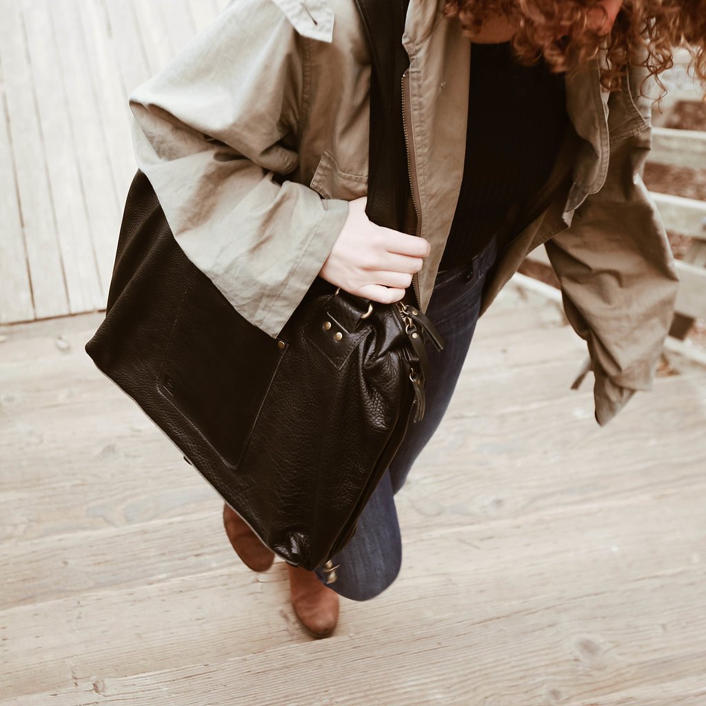 person carrying bag